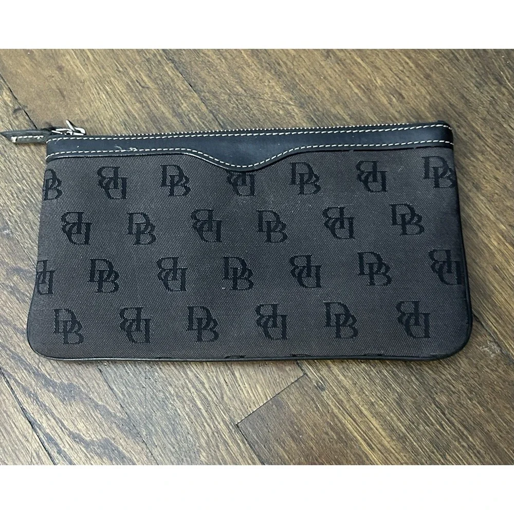 Dooney & Bourke black monogram zip pouch with a key ring attachment